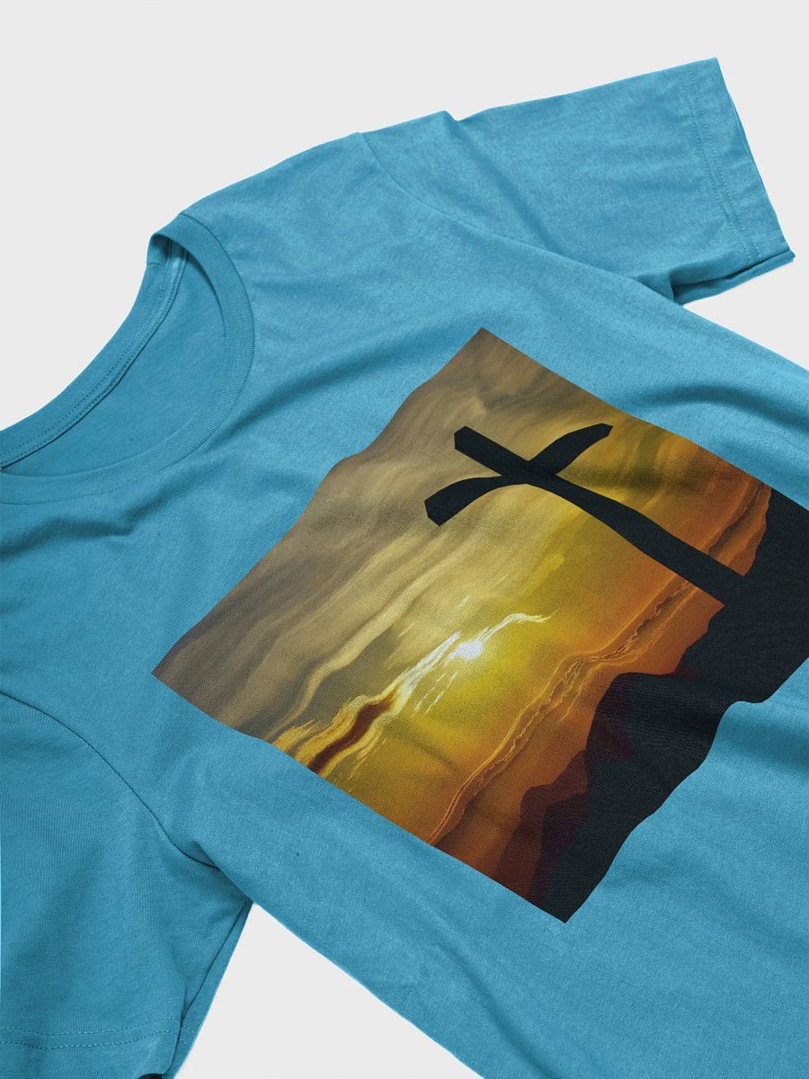 Large cross silhouetted against a dramatic sunset, vibrant hues of yellow, orange, dominate the sky, with clouds and distant mountains t-shirt product image (4)