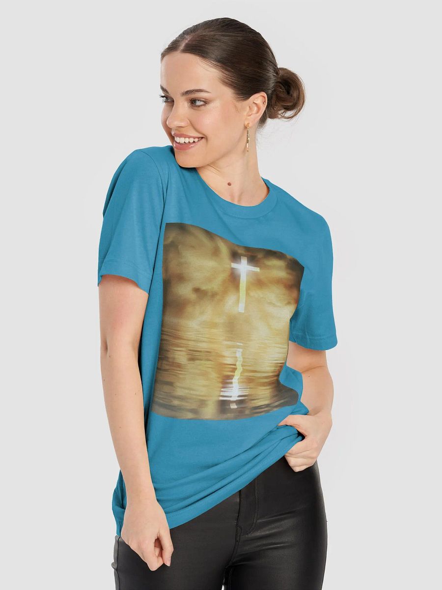 Glowing cross illuminated by intense golden light, reflecting on calm water below t-shirt product image (5)