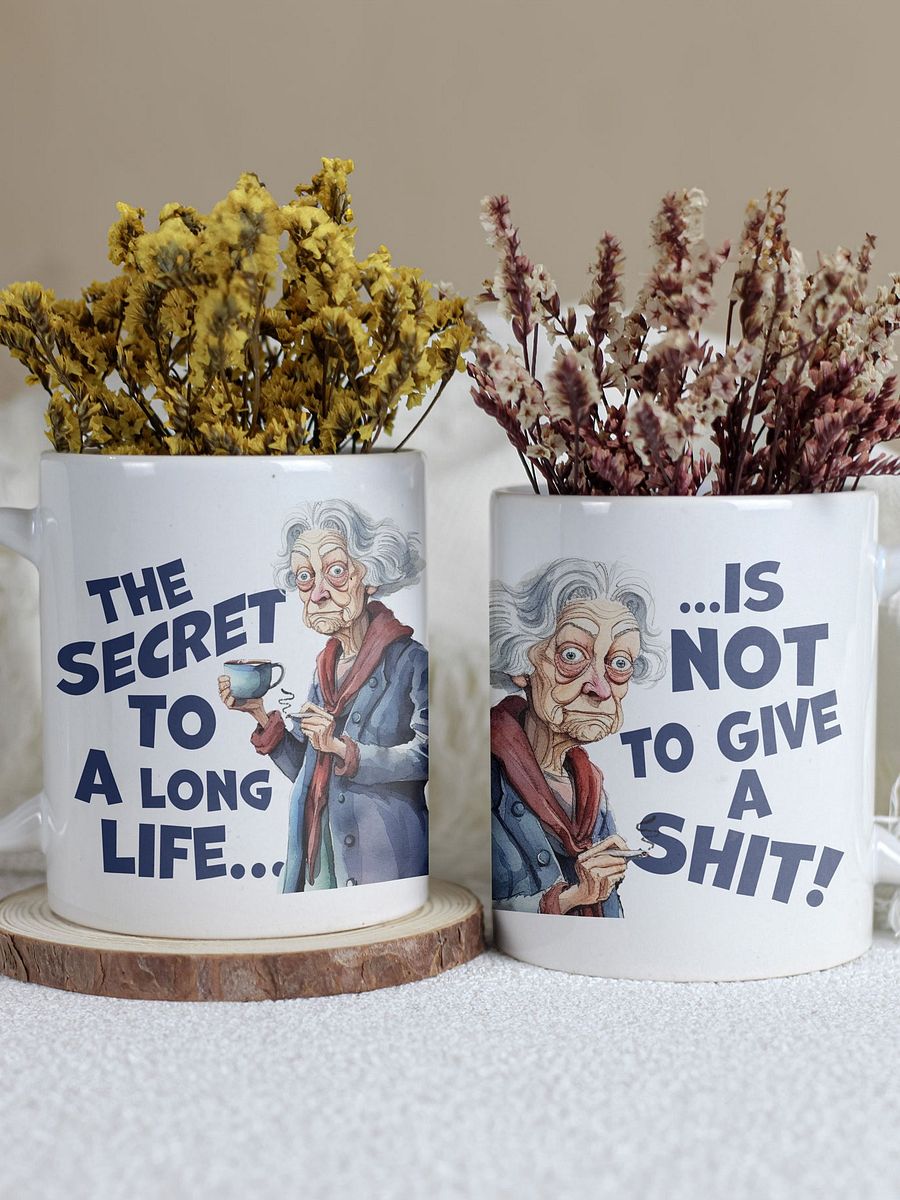 "The secret to a long life... is not to give a shit!" White glossy mug product image (1)