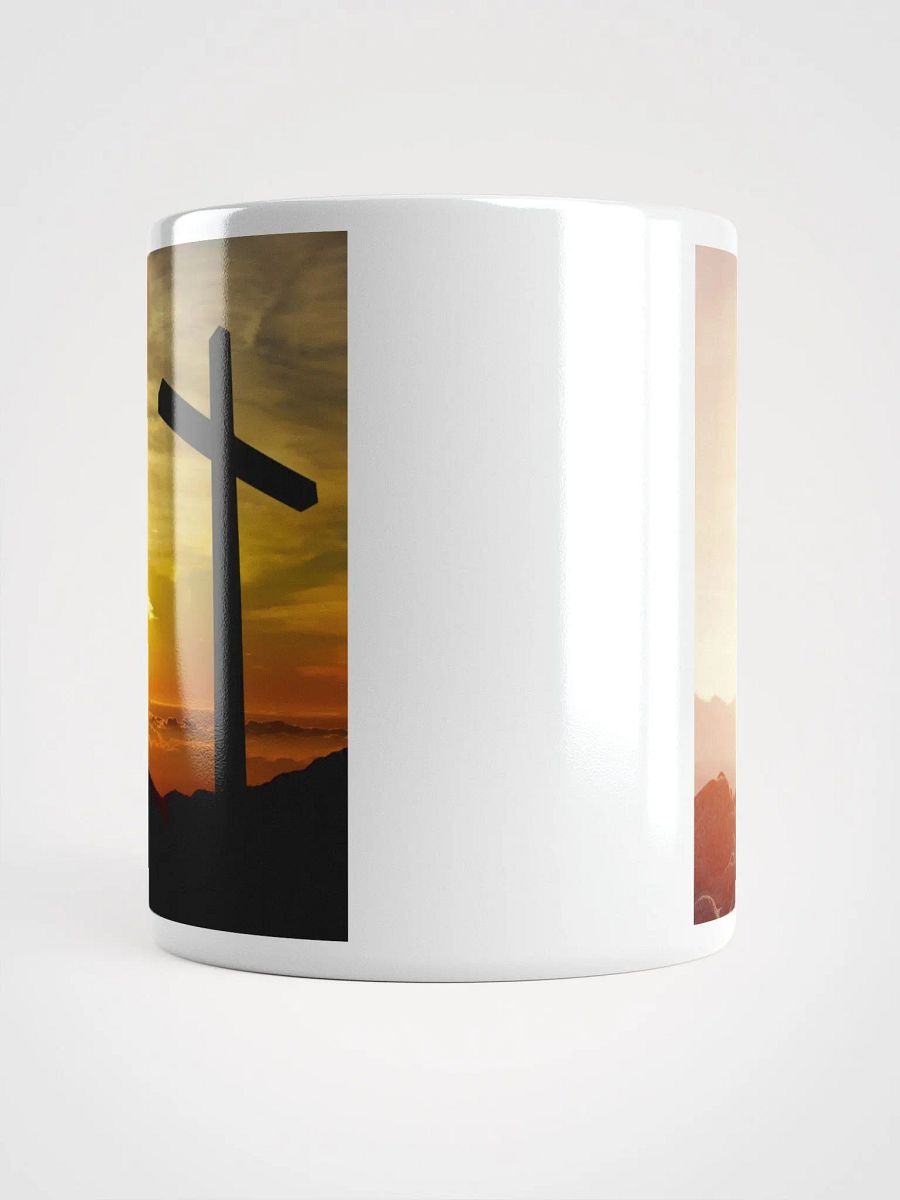 Large cross silhouetted against a dramatic sunset & a cross placed on top of a rocky hill, bathed in the warm glow of a sunrise or sunset Mug product image (4)