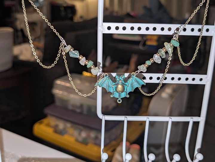 Turqoise Bat Crystal Necklace product image (1)