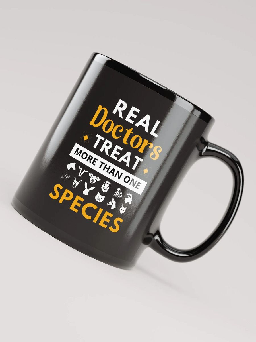 "Real doctor treat more than one species" black glossy mug product image (2)