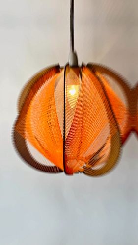 This is a wooden lampshade design with spun thread weave. It is woven in two layers to create a soft diffusing shade for your...