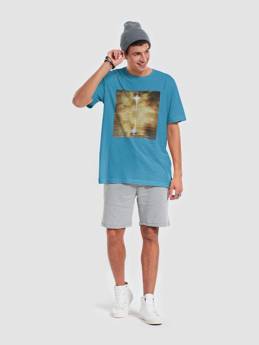 Glowing cross illuminated by intense golden light, reflecting on calm water below t-shirt product image (4)