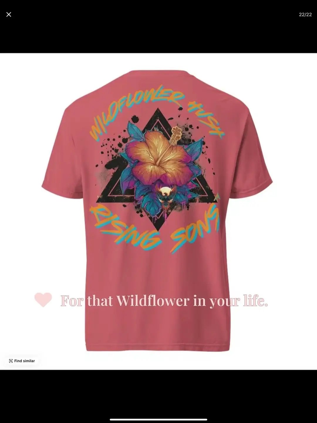 Centered around a vibrant hibiscus symbolizing resilience, femininity, and fire, the artwork radiates from a darkened triangle, representing sacred protection and the balance between chaos and calm. With Wildflower Hush arched above and Rising Sons™ anchored below, this tee bridges two worlds: softness and strength, growth and grit. #fyp #foryoupage #foryou #wilflowerhush #ridingwiththerisingson 