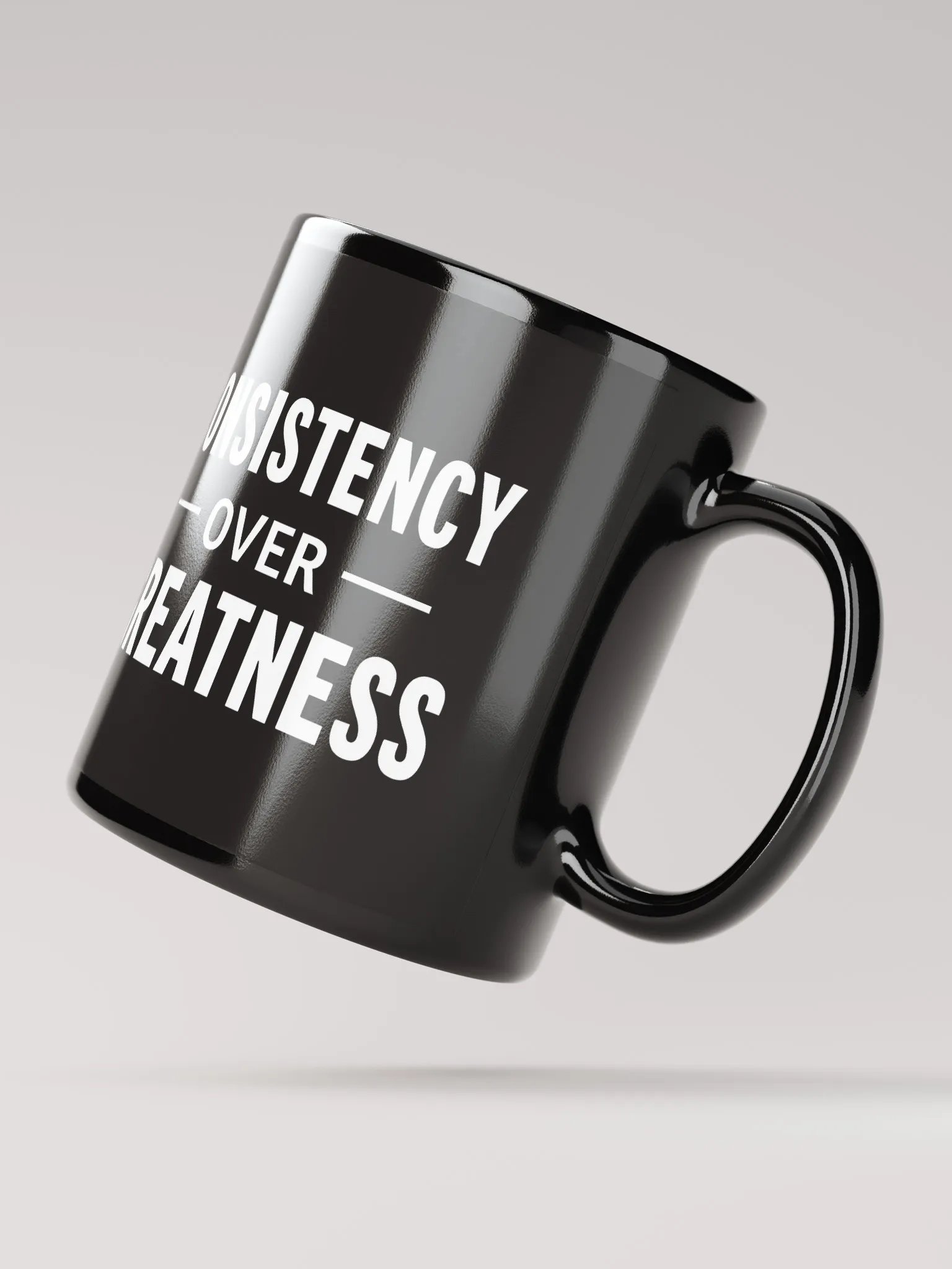 Unleash Your Inner Champion: The Rock’s Consistency Over Greatness Mug – Fuel Your Journey, One Sip at a Time product image (2)