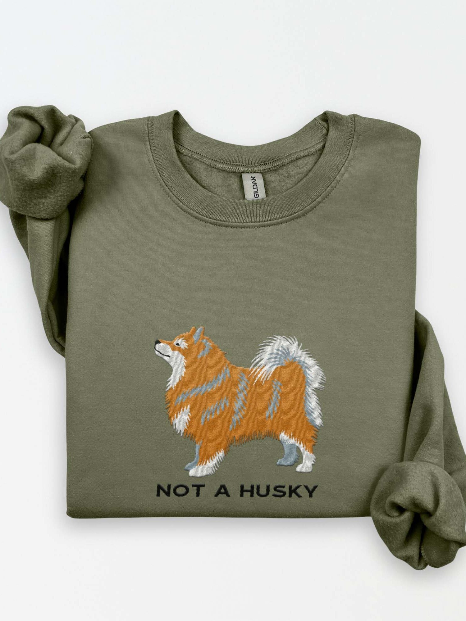 Not a Husky Sweatshirt (Embroidered) of a Finnish Lapphund(Brown) product image (1)