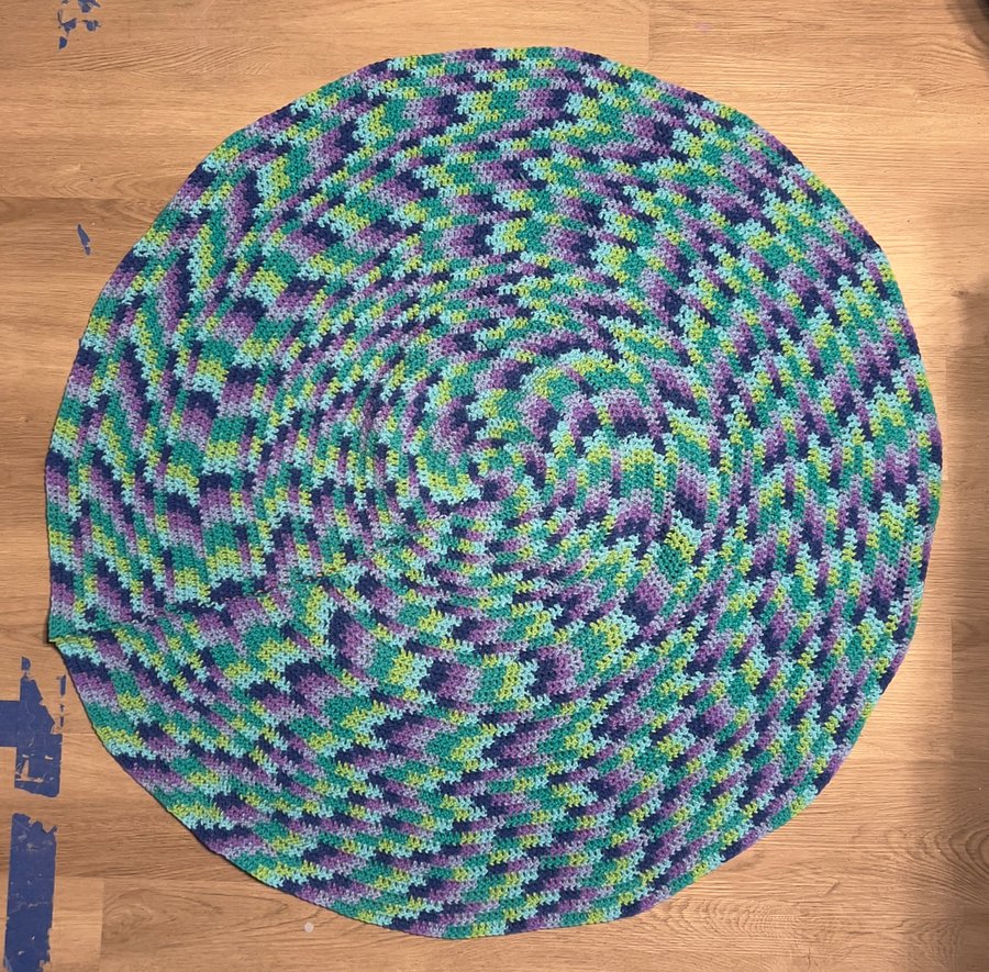 This speckled purple to green rug product image (1)