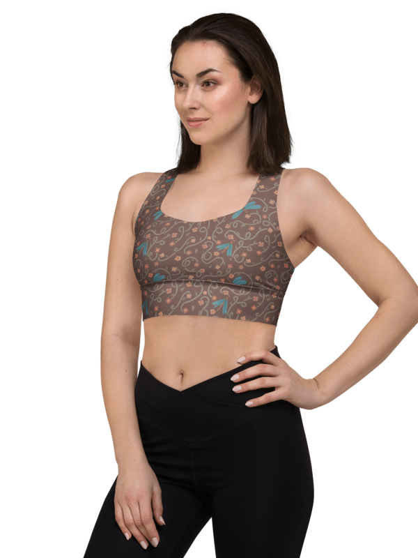 All-Over recycled longline sports bra. Dragonfly and floral artistic activewear product image (1)