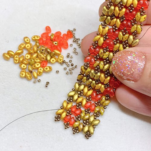 Good morning! Is anyone else working on something autumn inspired today? 🍂On my bead mat, on this cool and rainy morning, is ...