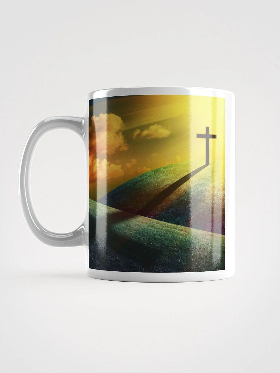 Wooden cross standing on a hill, silhouetted against a vibrant & colorful sky & a cross with a vivid, dramatic background Mug product image (5)