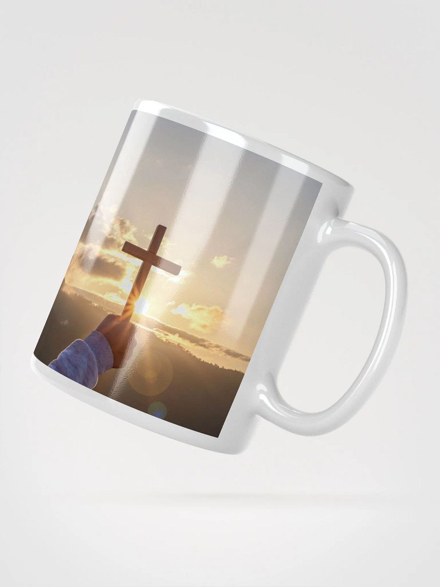 Cupped hands holding a glowing cross silhouette & Wooden cross being held up against the backdrop of a sunrise Mug product image (3)