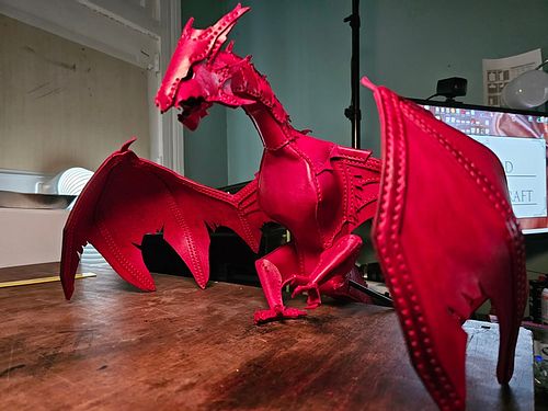 Complete!

After several weeks of off and on work, the dragon. Is. Finished. 

This guy has around a 30 inch wingspan from wi...