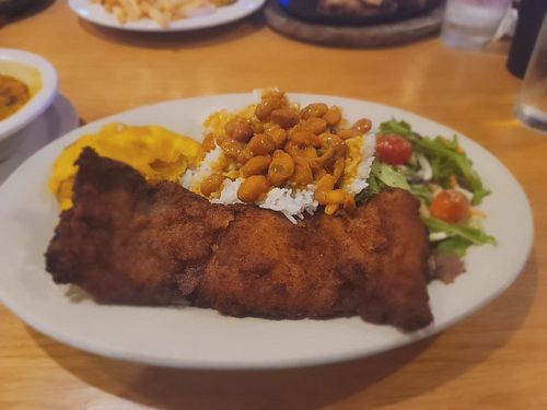 Had a lovely dinner last night with family! This was my meal, chuleta (pork chop) with white rice and red beans with a side o...