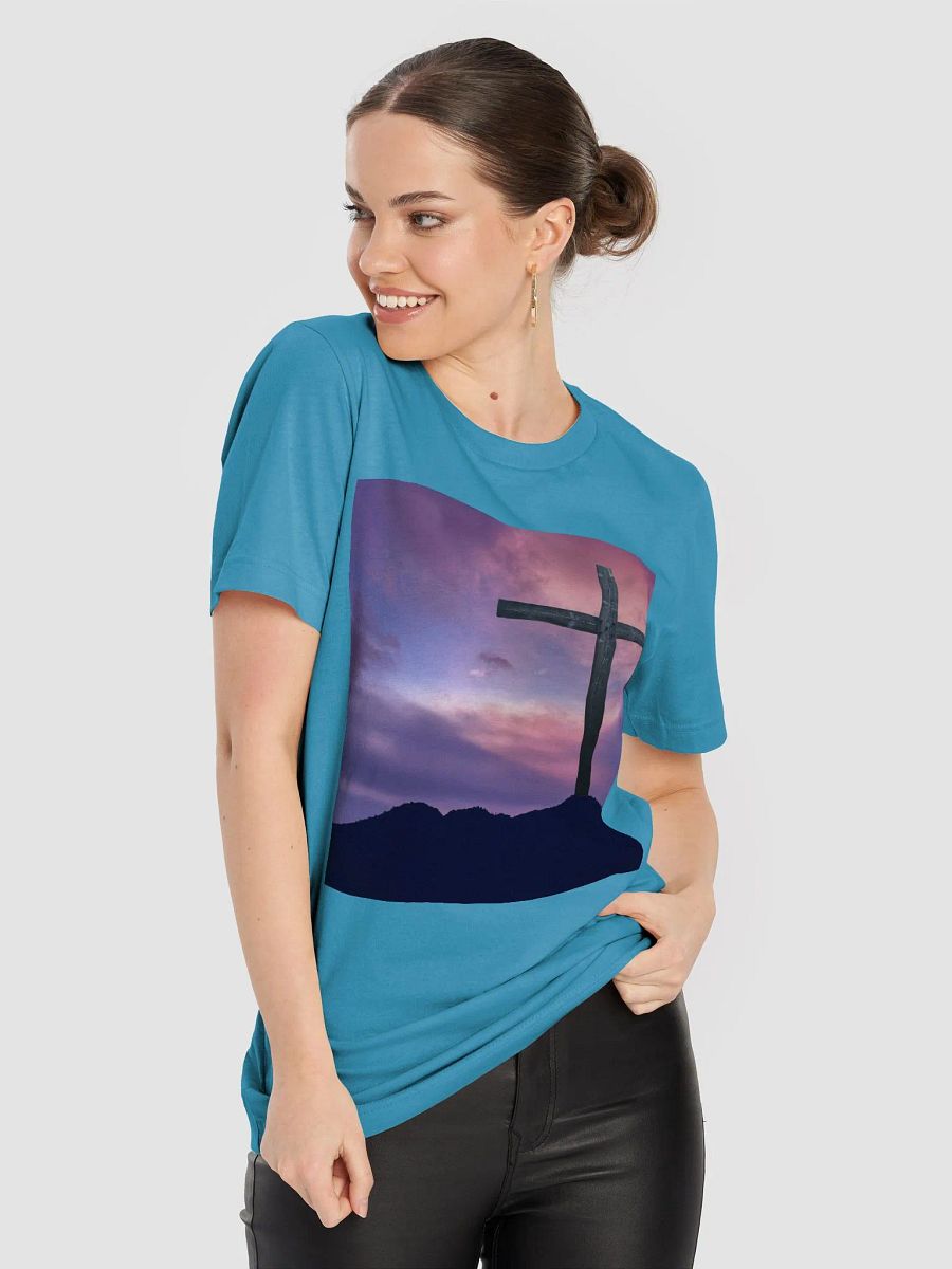 Wooden cross standing on a hill, silhouetted against a vibrant and colorful sky transitioning from deep purples to pinks t-shirt product image (6)