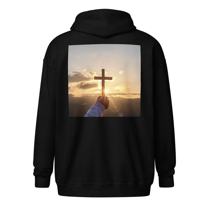 Wooden cross being held up against the backdrop of a sunrise Hoodie product image (1)