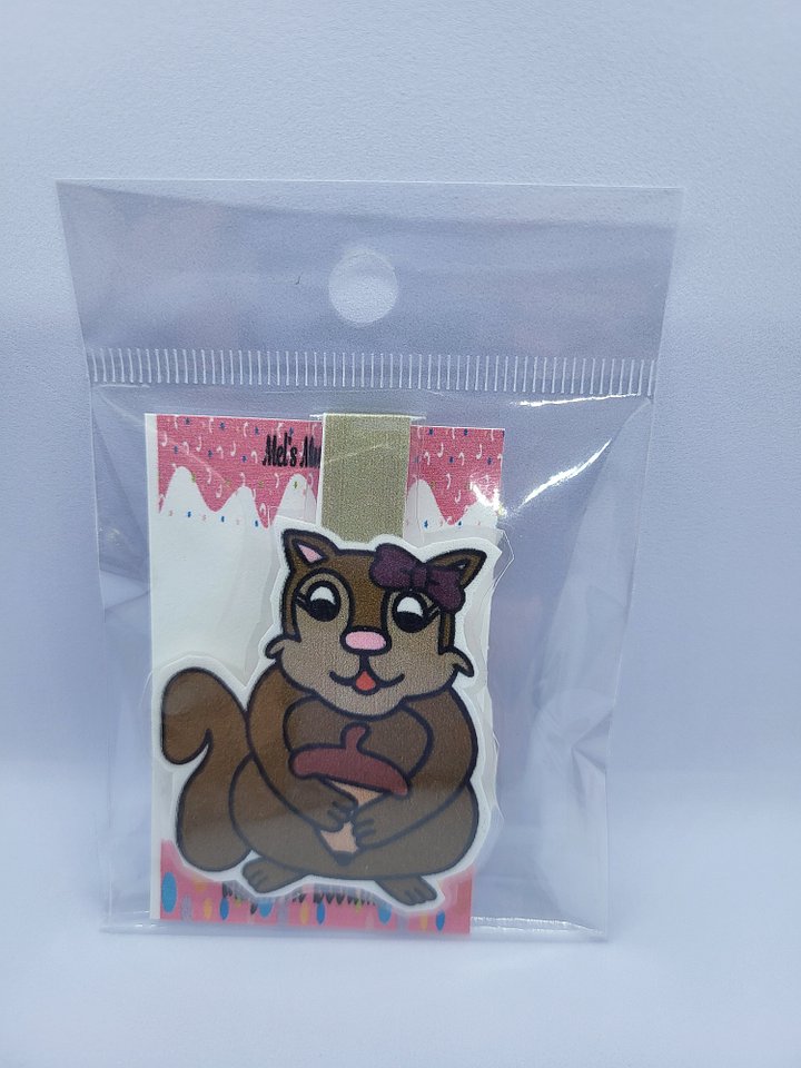 Cute Cartoon Girl Squirrel with a Bow Holding a Giant Acorn Laminated Magnetic Bookmark product image (1)