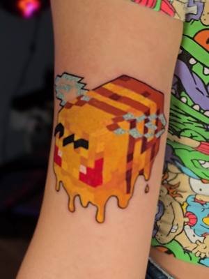 why bot have a minecraft bee tattoo? 