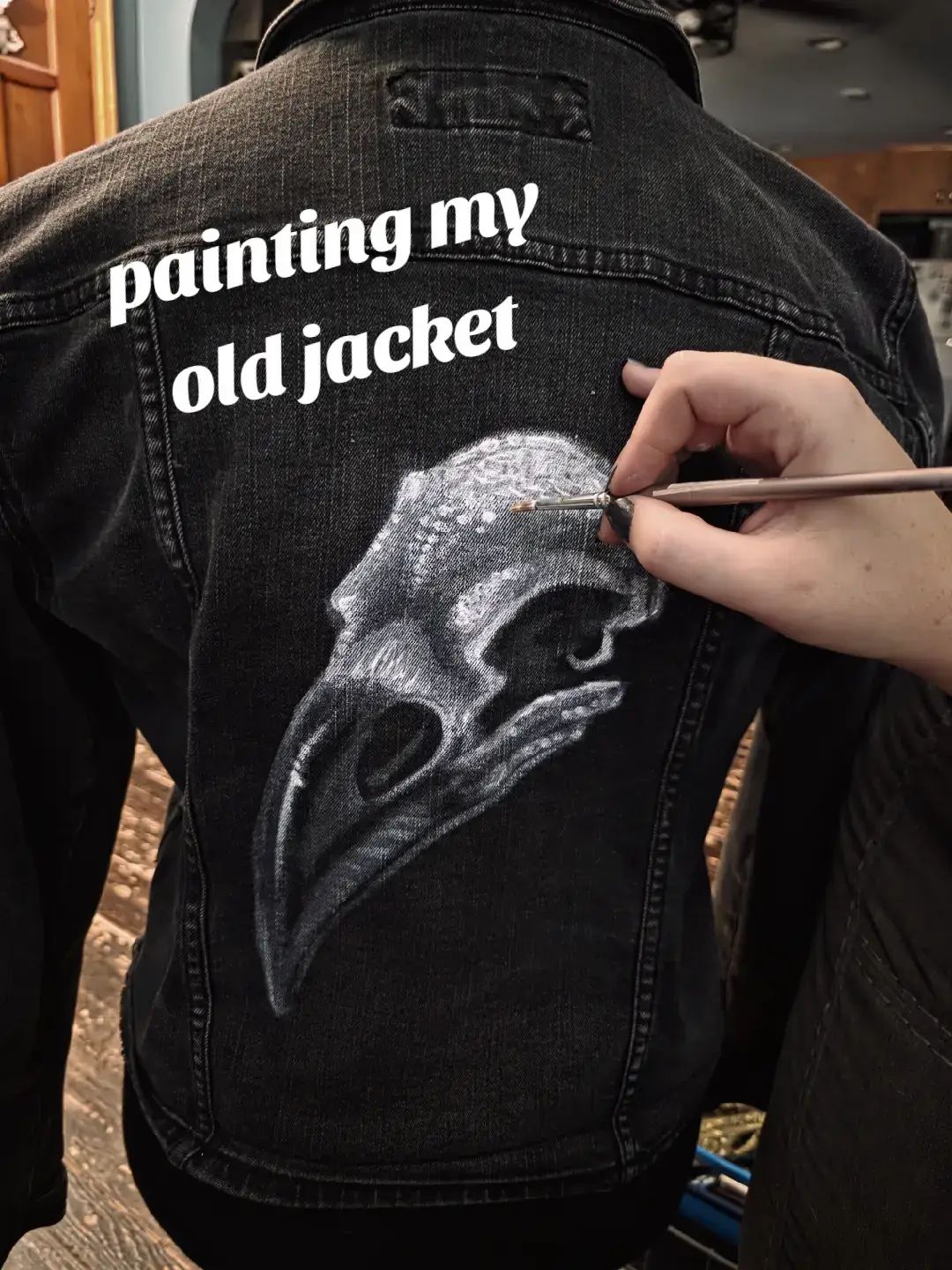 wip! I'm painting another one of my jackets! I think I'm staying black & white on this one. maybe I'll add some tints for depth. I don't draw a ton of plants but I think they're cute enough 🖤 #raven #fern #cottagecore #paintedjacket #paintedclothes #artist #handdrawn #alt #diy #streamer #alttiktok #skulls 