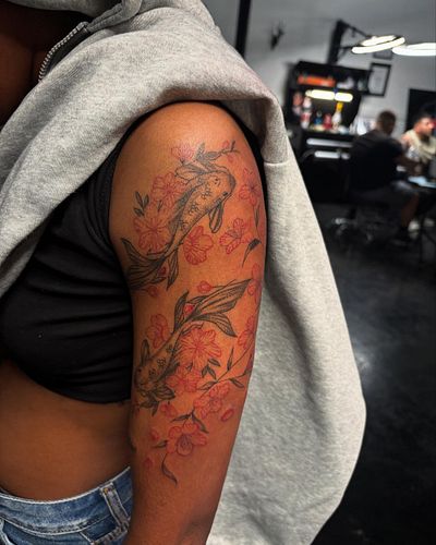 Koi fish all healed up and looking better than ever with some fresh flowers! Did a few small tattoos too. Big thanks for bein...