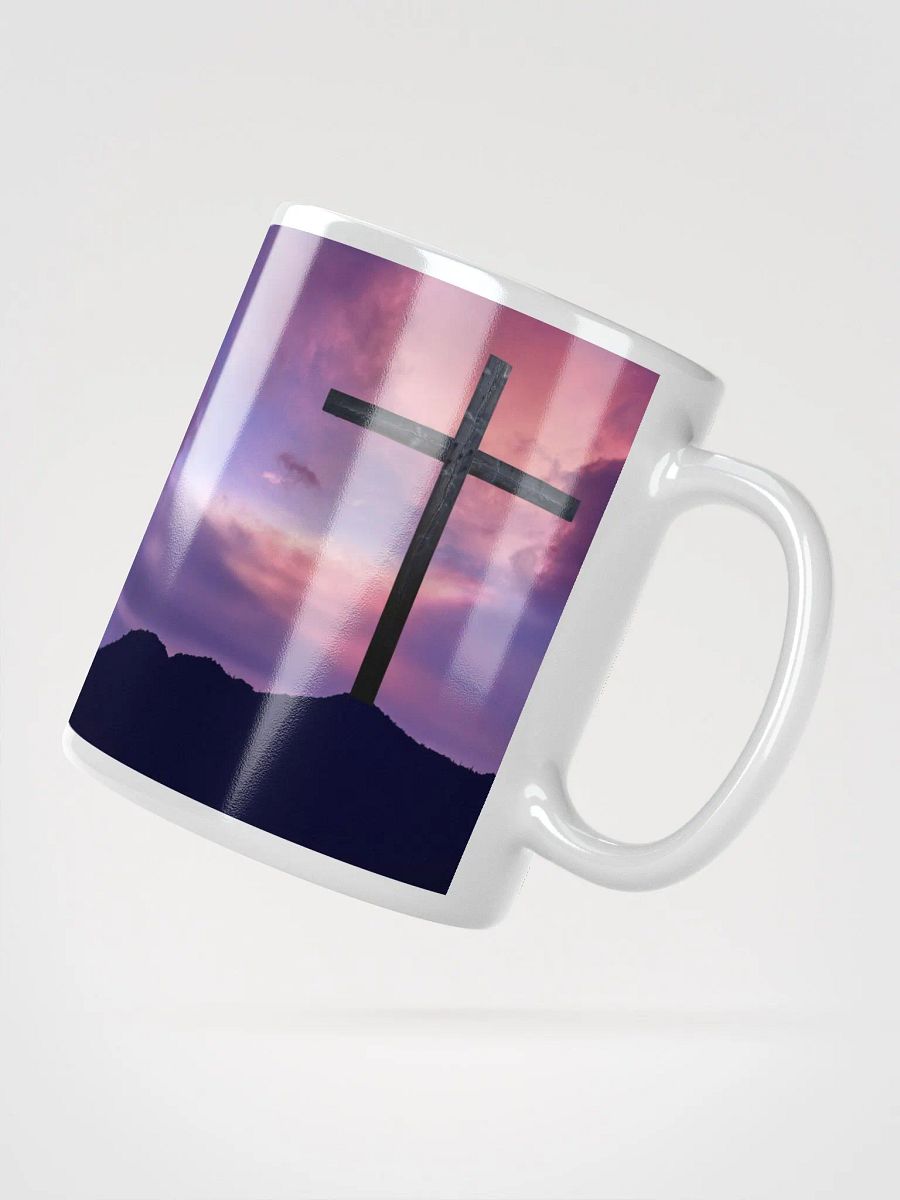 Wooden cross standing on a hill, silhouetted against a vibrant & colorful sky & a cross with a vivid, dramatic background Mug product image (4)